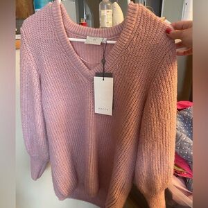 Woman’s sweater (hanging)​